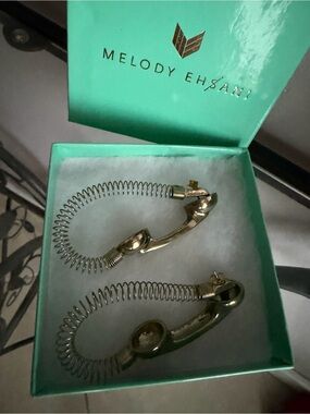 Melody Ehsani Gold Retro Handset Coil Hoop Earrings